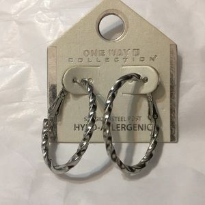 Silver twisted oval shaped hoop earrings